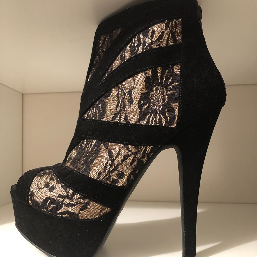 Black and gold accent bootie heels